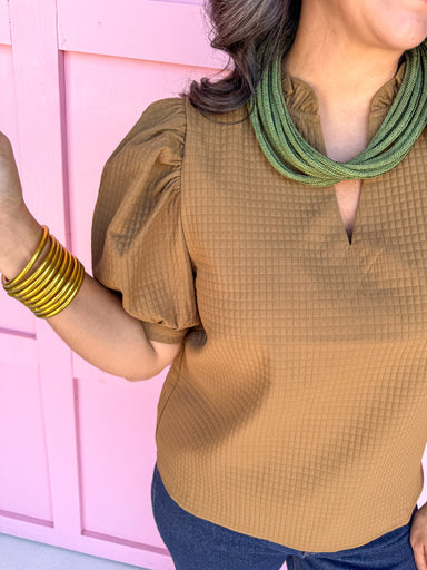 ruffle v neckline puff sleeve button cuff olive waffle material olive womens boutique jincy's