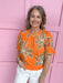 Jincy's Women's Boutique Spring Styles orange embroidered floral top