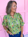 Jincy's women's sage floral top with ruffle neckline