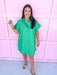 full button front stand-up collar mini dress delicate stitch hem detailing and intricate cuff embroidery green mini length short sleeves womens boutique jincy's