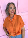 boutique womens button up shirt orange jincys