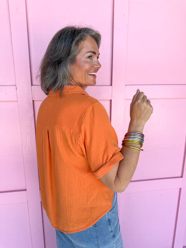 boutique womens button up shirt orange jincys