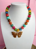 LOVE LEMON LANE | Medium Glass Bead Necklace With Butterfly Pendant- Multi