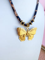 LOVE LEMON LANE | Corded Butterfly Necklace - Leopard