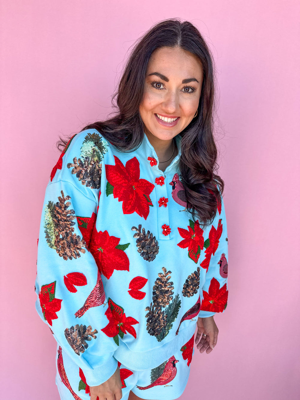 QUEEN OF SPARKLES | Aqua Poinsettia, Cardinal, & Pine Cone Henley Sweatshirt