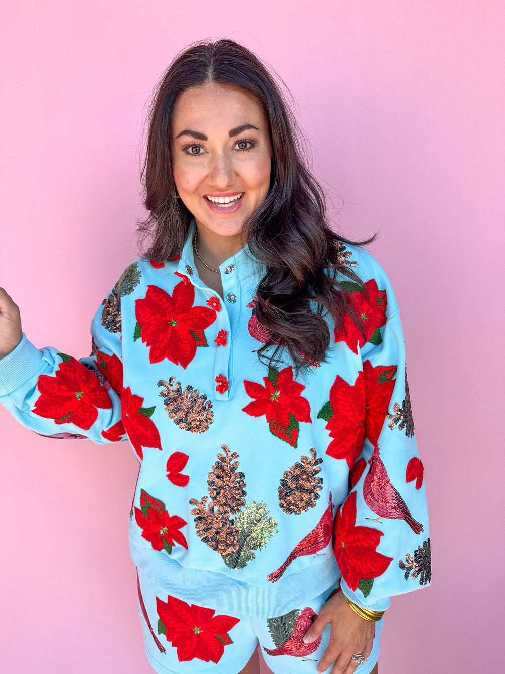 QUEEN OF SPARKLES | Aqua Poinsettia, Cardinal, & Pine Cone Henley Sweatshirt