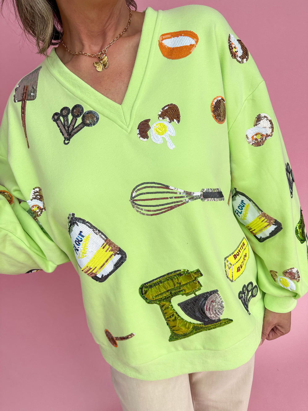 QUEEN OF SPARKLES | Neon Green Baking Icon V Neck Sweatshirt