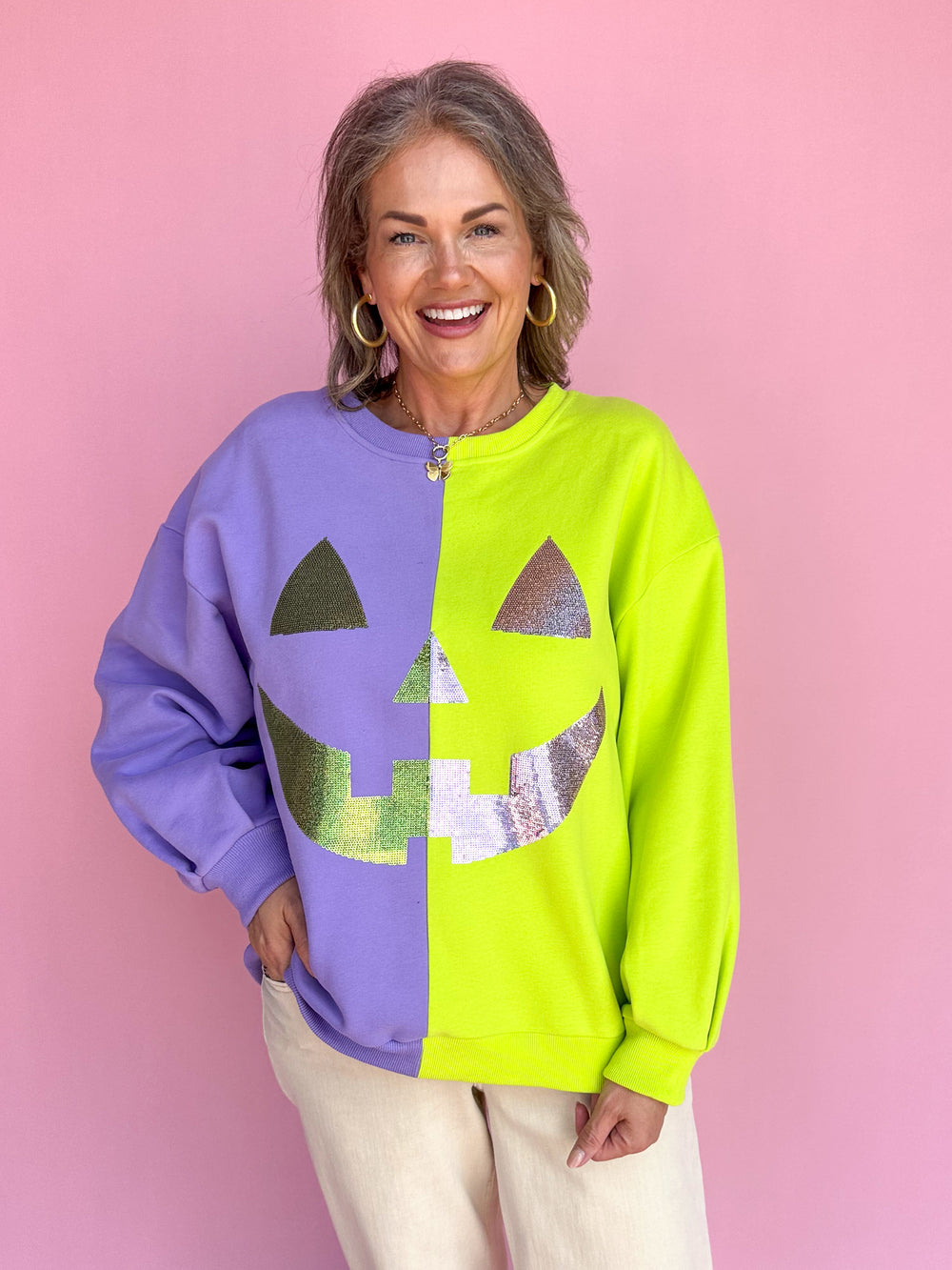 QUEEN OF SPARKLES | Purple & Neon Green Split Pumpkin Face Sweatshirt