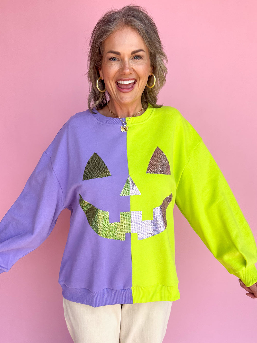 QUEEN OF SPARKLES | Purple & Neon Green Split Pumpkin Face Sweatshirt