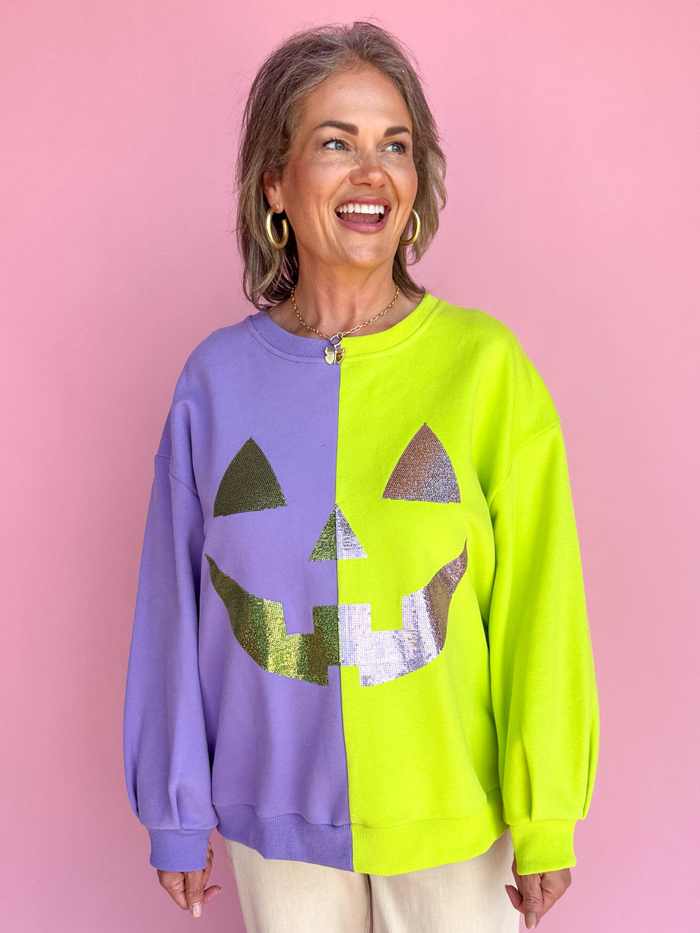 QUEEN OF SPARKLES | Purple & Neon Green Split Pumpkin Face Sweatshirt