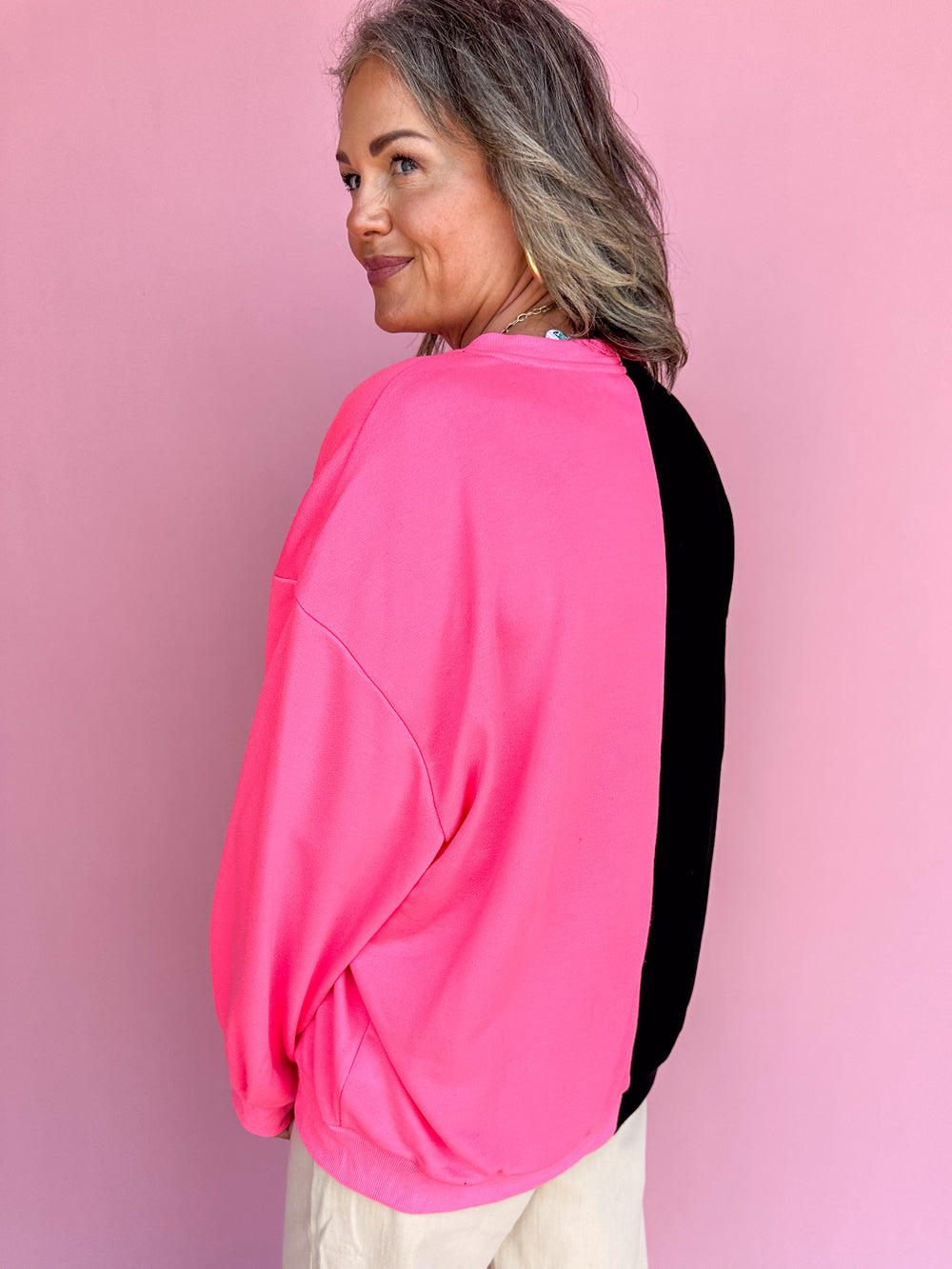 QUEEN OF SPARKLES | Black & Neon Pink Split Pumpkin Face Sweatshirt