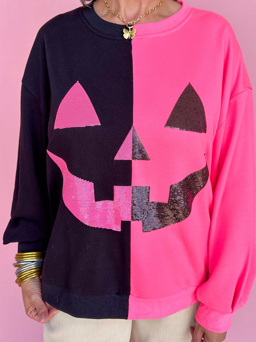 QUEEN OF SPARKLES | Black & Neon Pink Split Pumpkin Face Sweatshirt