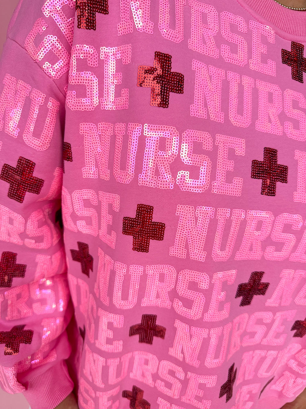 QUEEN OF SPARKLES | Pink Nurse All Over Sweatshirt